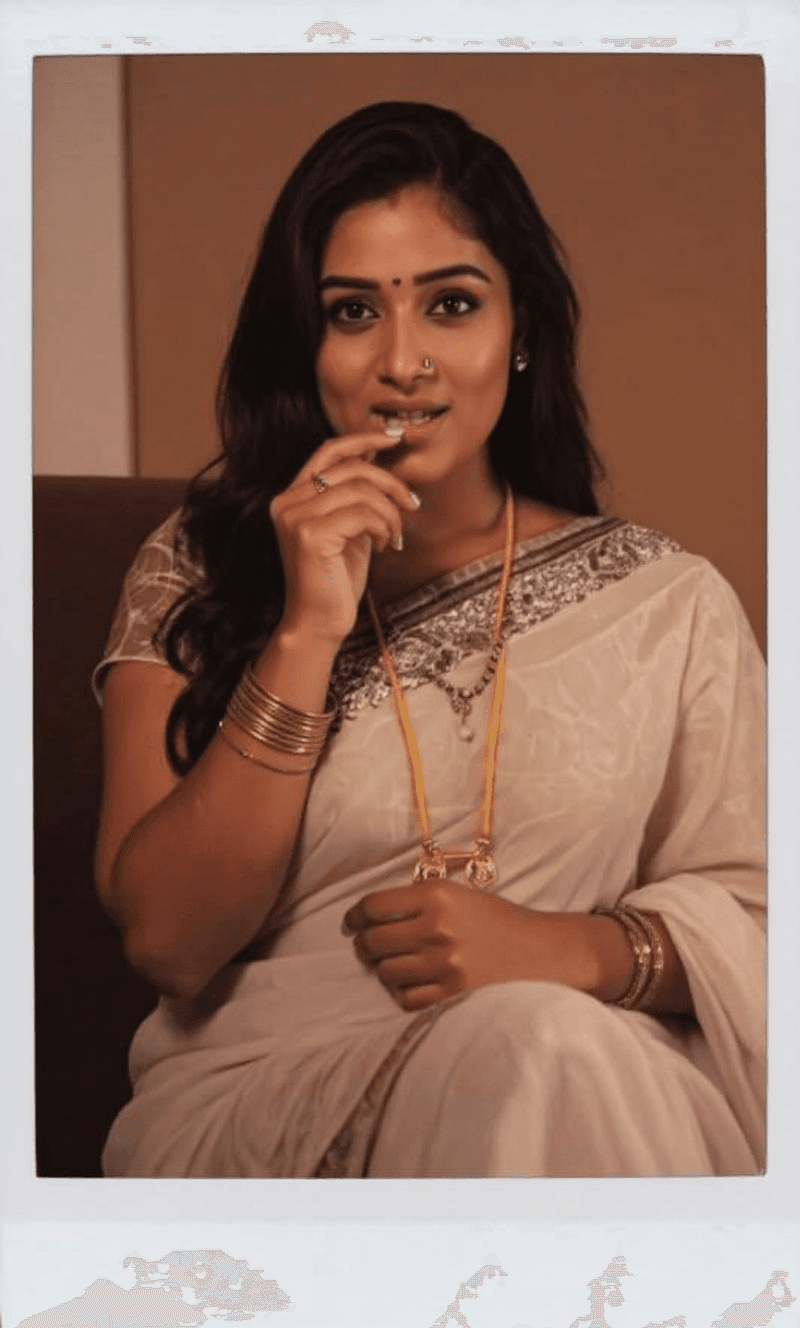 AI generated: Nayanthara biting her lip, 18-21 years old, brown hair, Indian hair style, saree,trying to removing ...