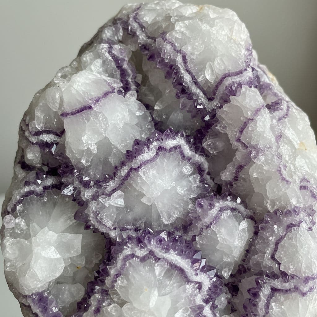 AI generated: Milky white crystal with purple crystal layered hundreds of times through out it 