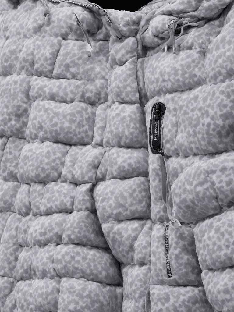 AI generated: milky Fubu winter puffer jacket, design trend, design by kanye west, on a white background, octane, ...