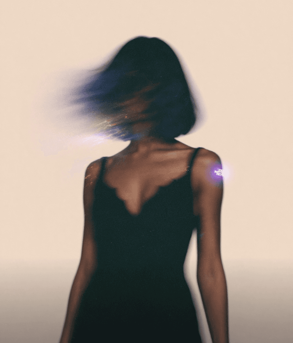 AI generated: A surreal, low-angle portrait of a woman dressed in an eveningwear elegant black dress, standing aga...