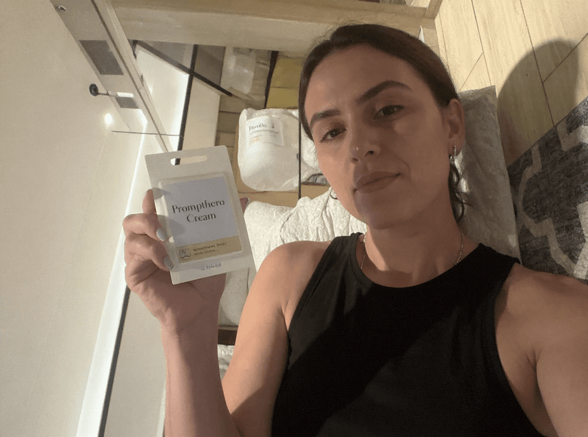 AI generated: The woman shows the package on her hand and it says "Prompthero Cream"