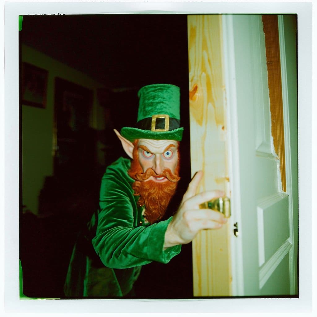 AI generated: grainy 80's photograph quality polaroid of a leprechaun caught in an abandoned house, dark, uncanny,...