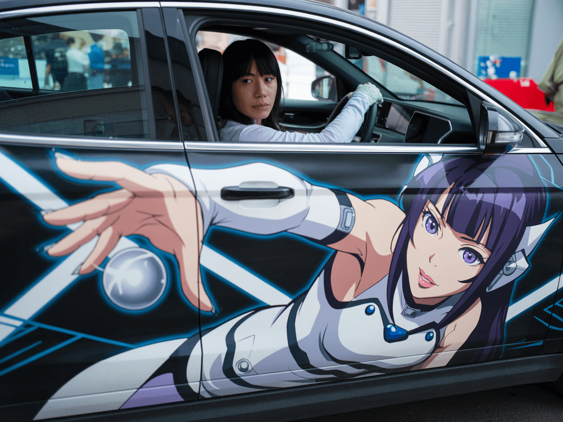 AI generated: A photograph of a woman in a white long-sleeved shirt sitting in a car, with a large anime-style mur...