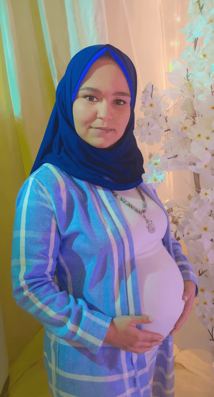 AI generated: Make woman pregnant in Nineth Month 
Pregnant in 4 babies 
Big pregnant bump 