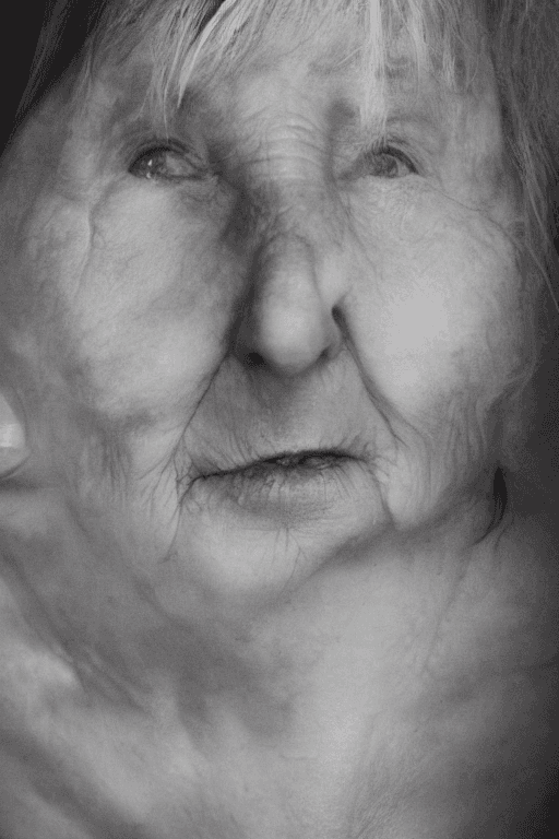 AI generated: a beautiful photo of a old woman nude posing for a picture in a bedroom,transgressive art,imperfect ...