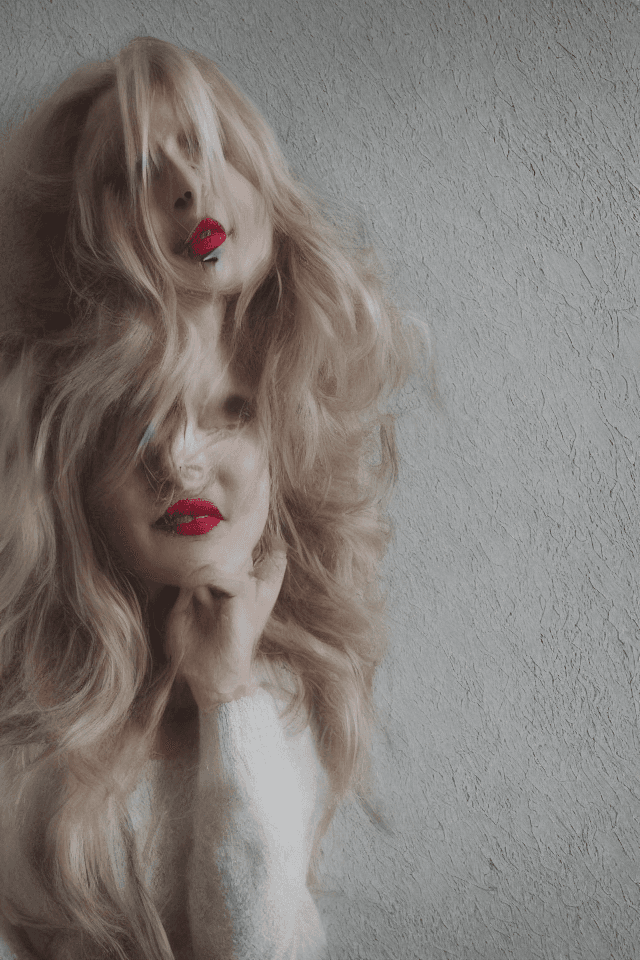 AI generated: a 30 yo woman, blonde,  portrait of beautiful  woman, white hair, eductive smile, red lips, white sh...