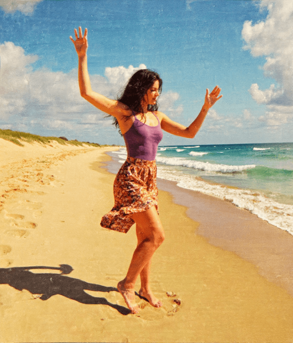 AI generated: woman dancing on the beach