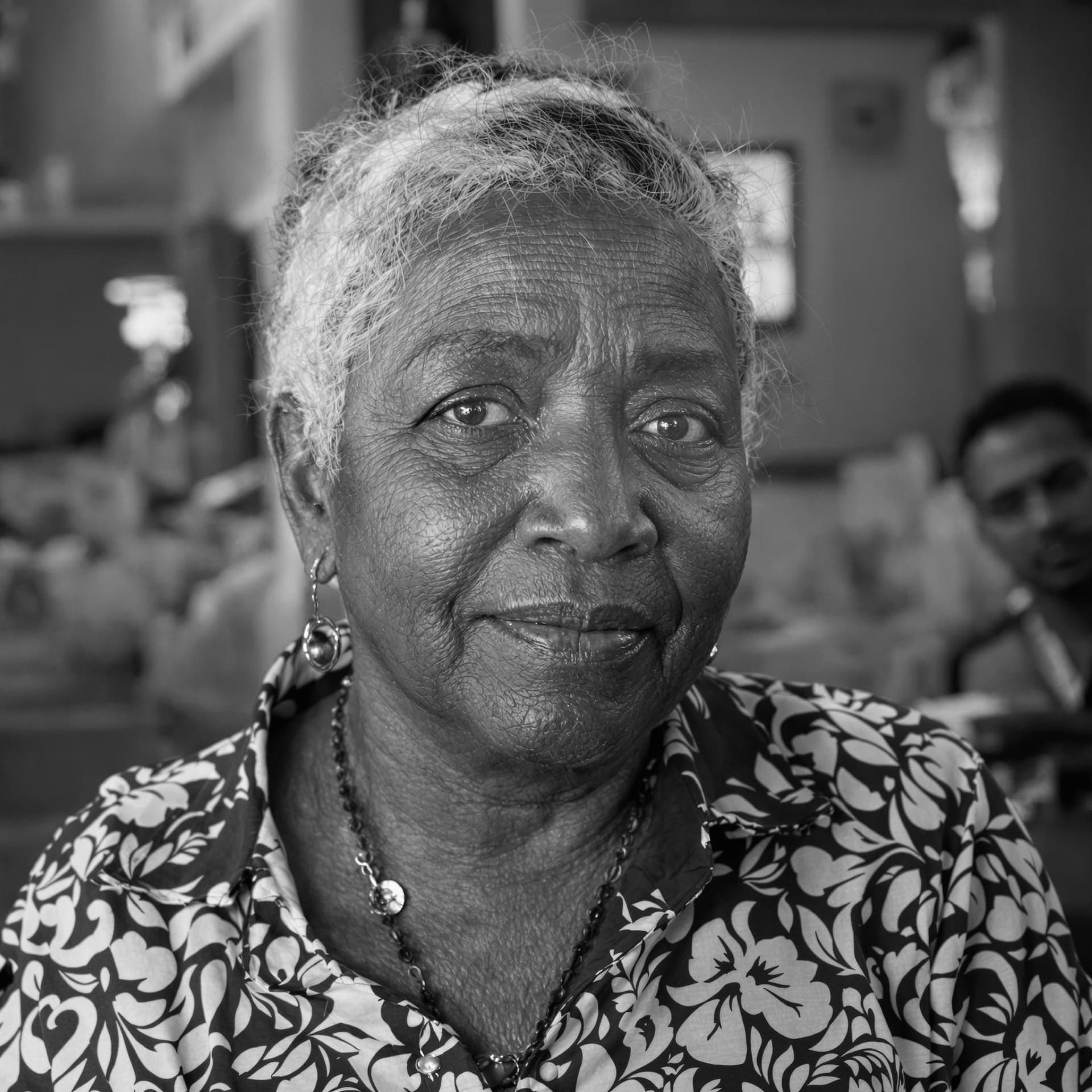 AI generated: raw photo, low contrast (portrait: 1.57), (dominican woman 48-years- old :1.15)