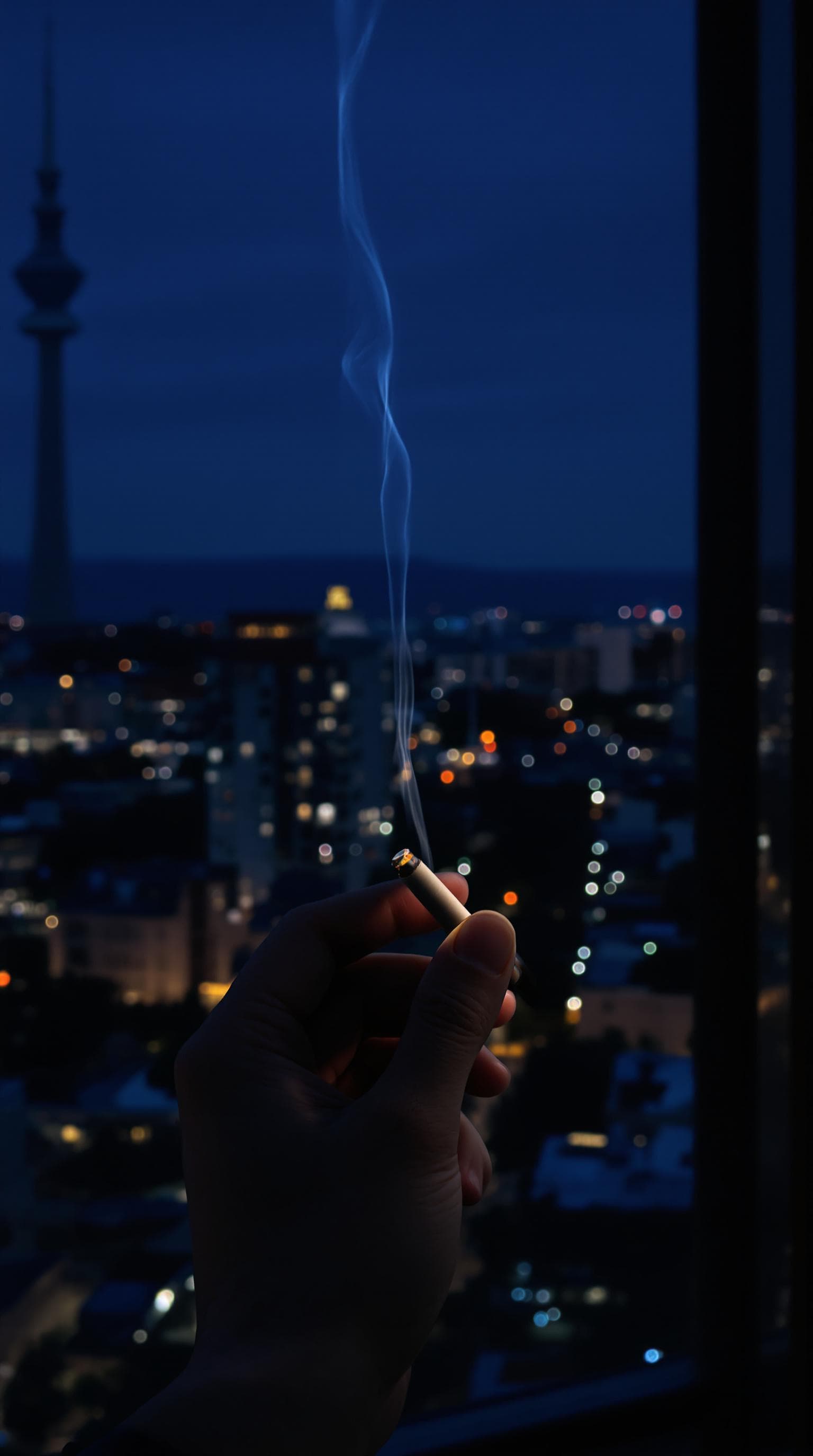 AI generated: pov first-person, i am standing by the open window, smoking a cigarette professionally . only my han...
