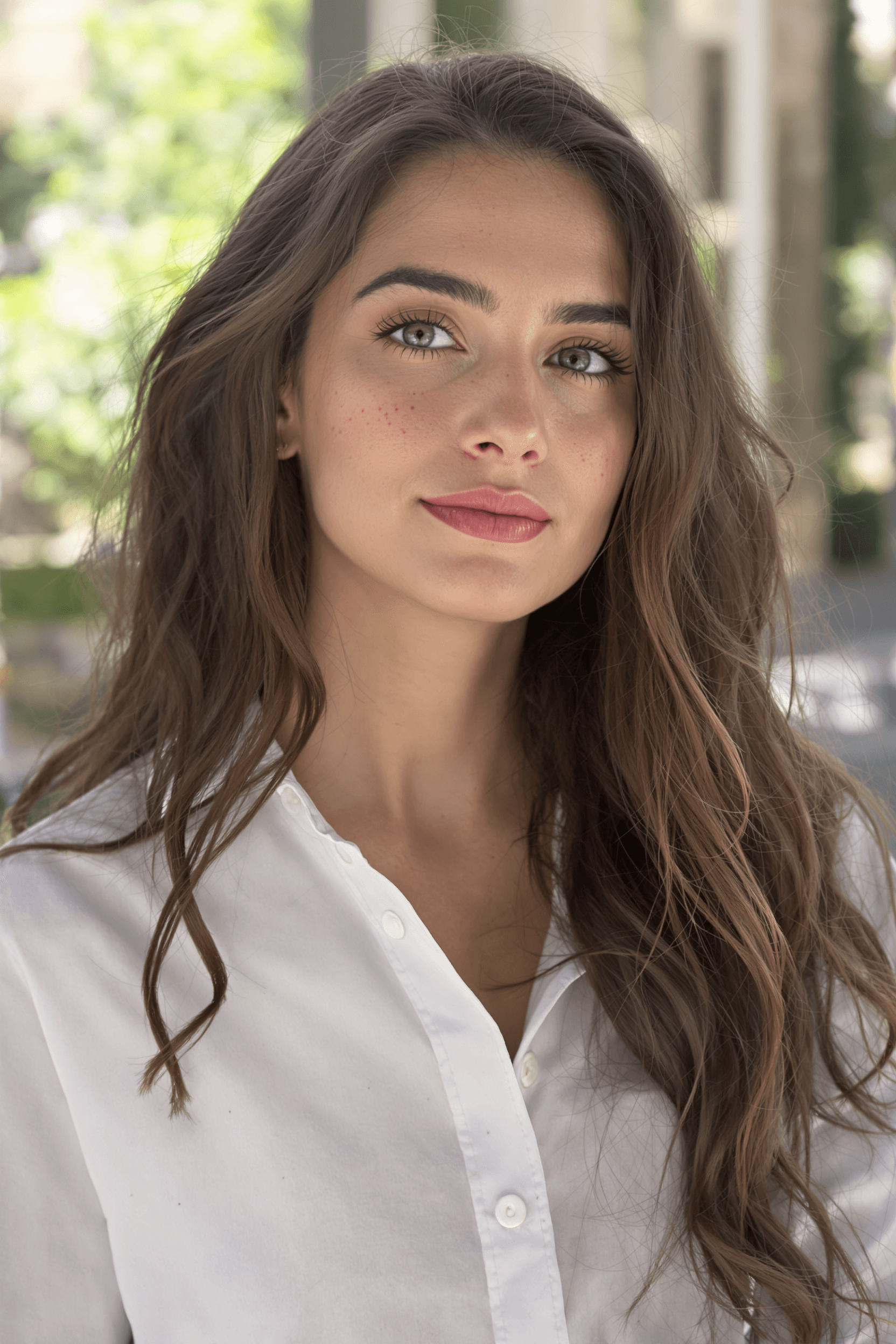 AI generated: A realistic portrait of a woman in her early 20s, natural beauty, minimal makeup, soft and even skin...