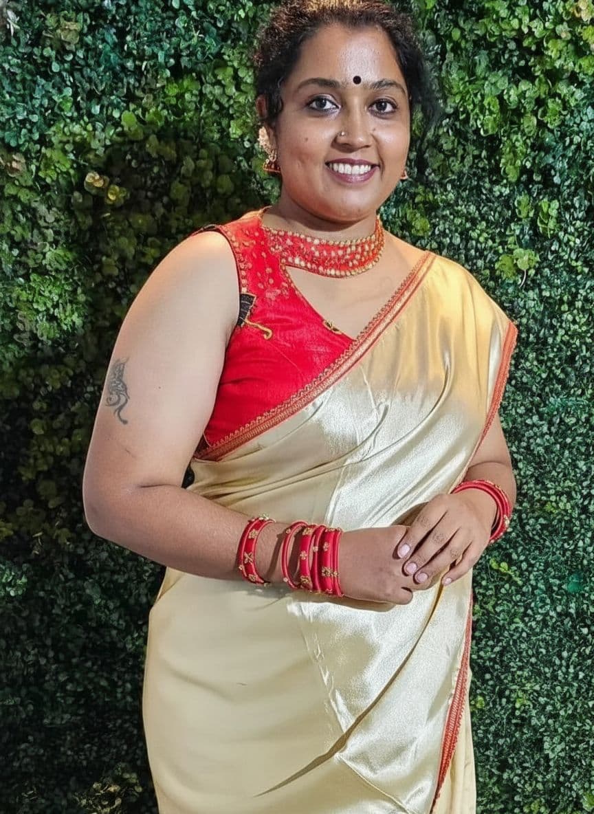 AI generated: Saree removed 
