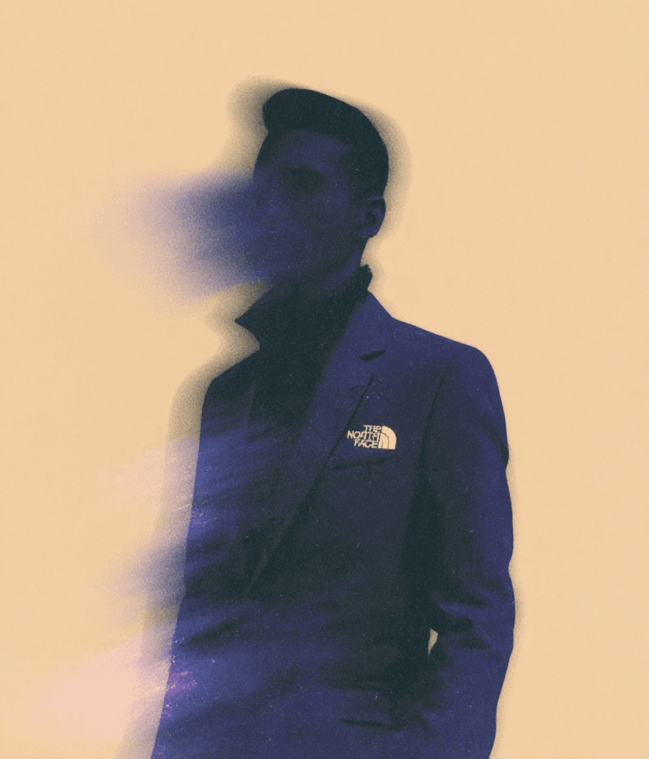 AI generated: A surreal, low-angle portrait of a man dressed in an eveningwear , standing in a dramatic pose again...