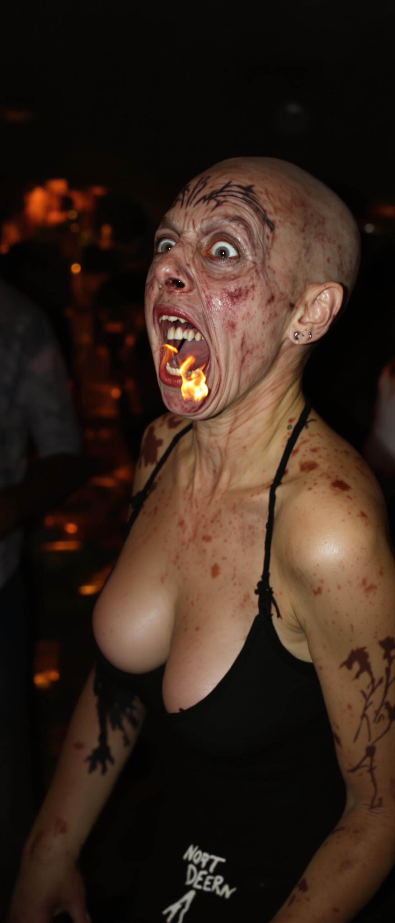 AI generated: An ugly face woman with ugly body  dancing in a party with fire from her mouth  . She is bald . She ...