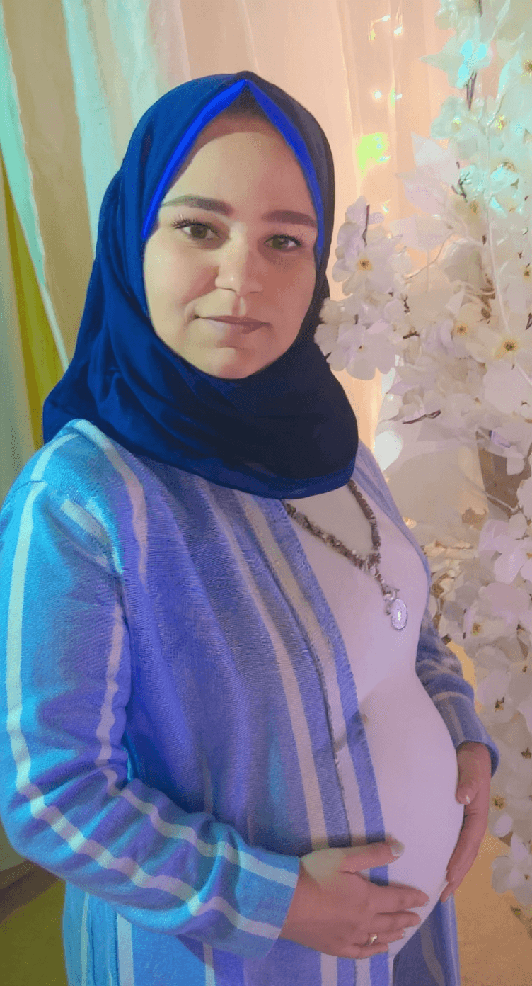 AI generated: Make woman pregnant in Nineth Month 
Pregnant in 4 babies 
Very big pregnant bump 