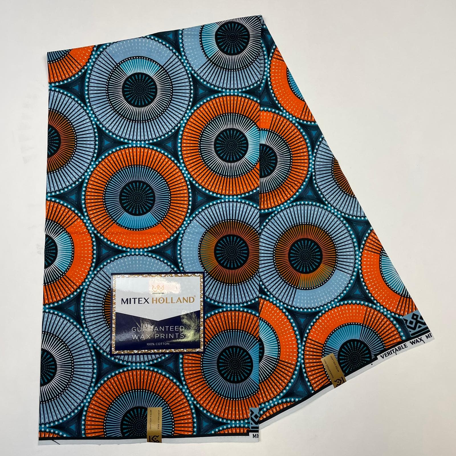 AI generated: Use vlisco as inspiration for an epic design, Dark blue with little golden design waxprint, wax Holl...