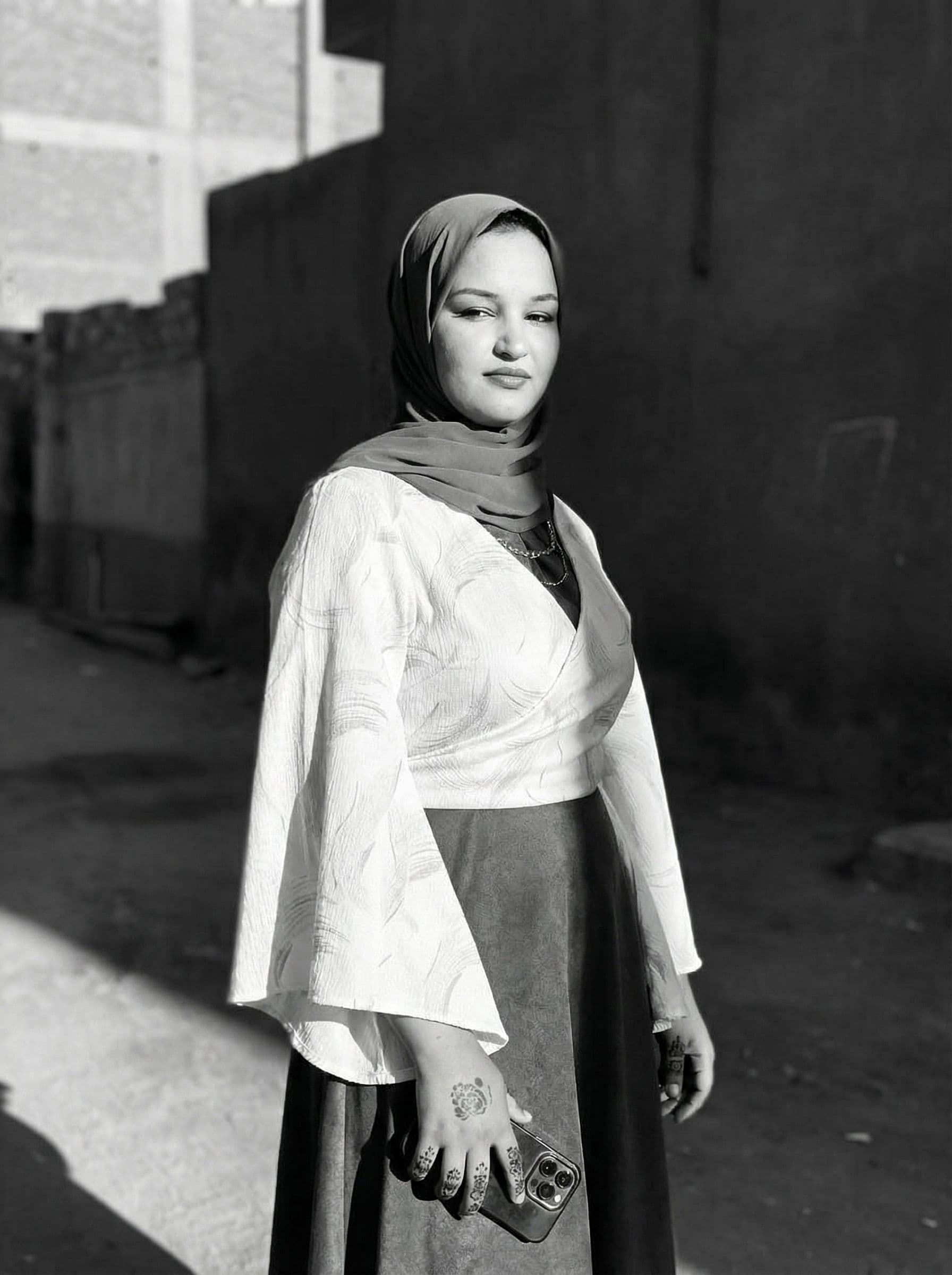 AI generated: a black and white photo of a woman with shadow., in the style of minimalist beauty, light bronze and...