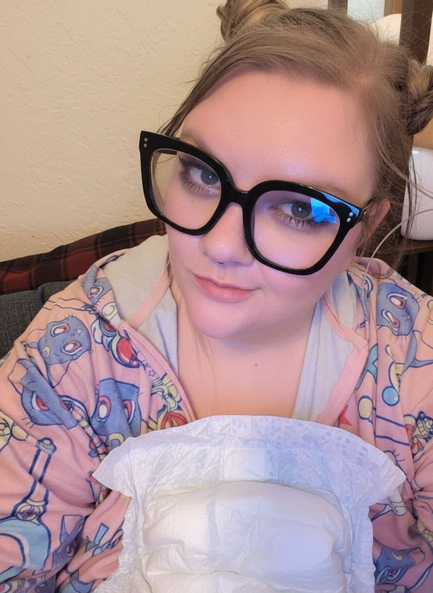 AI generated: Chubby blonde abdl girl with glasses