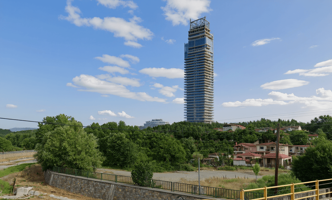 AI generated: Place a biophylic housing skyscraper on this image  