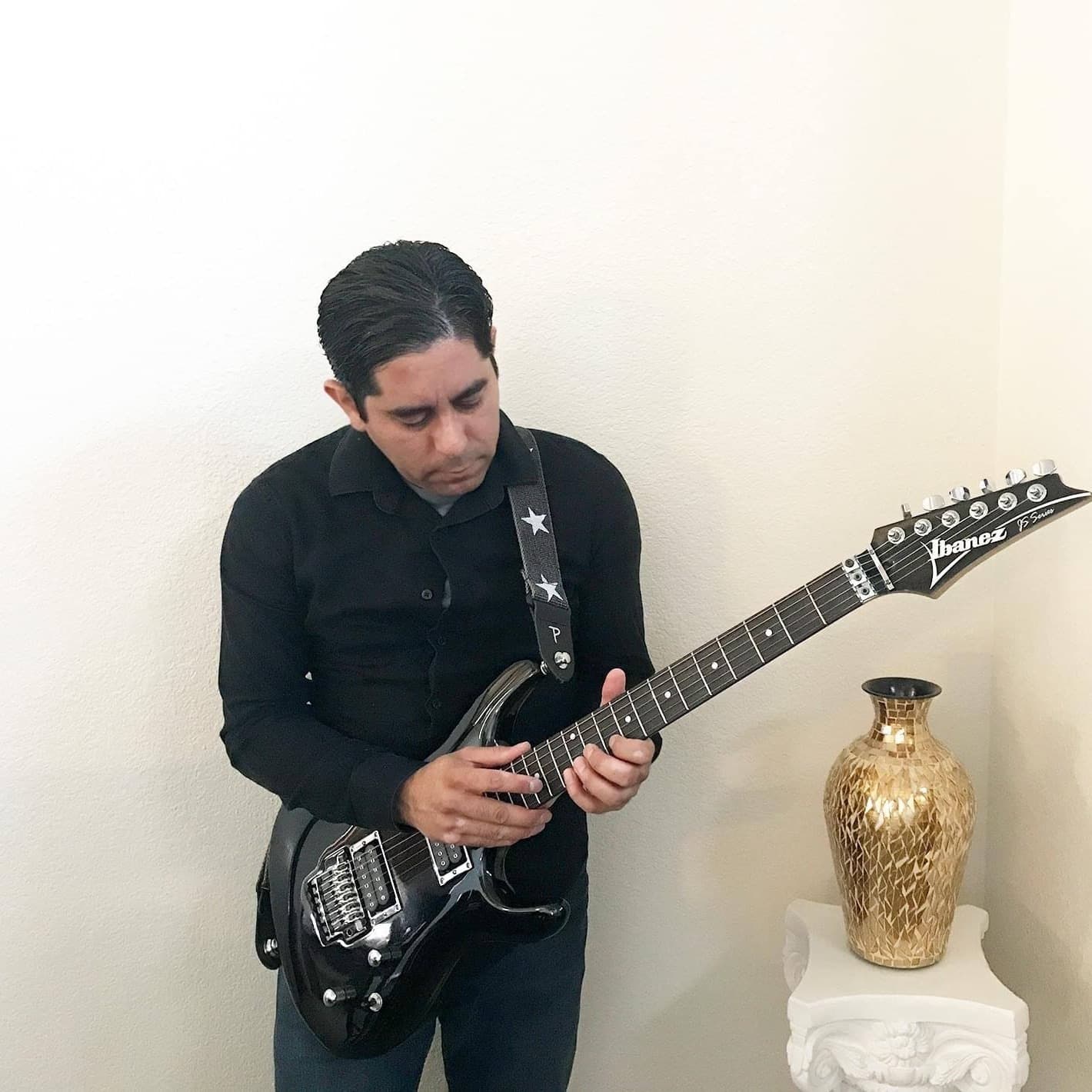 AI generated: blue guitar with white background