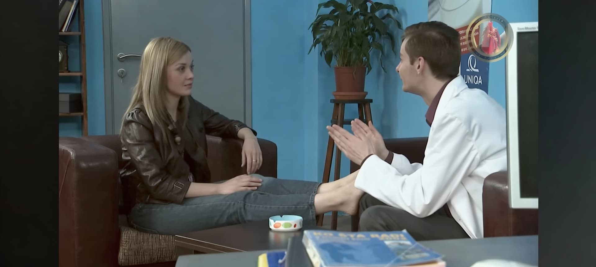 AI generated: She puts her feet on him