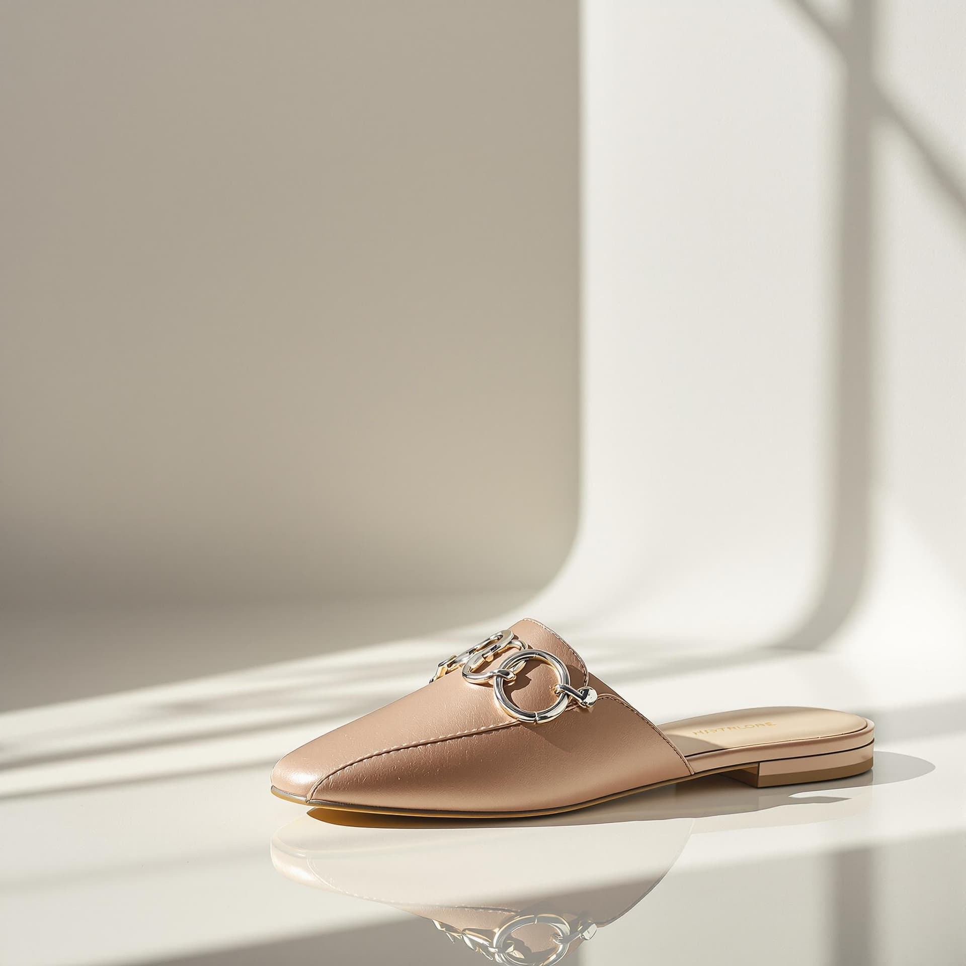 AI generated: A hyper-realistic studio fashion shoot of a stylish women’s flat slipper, captured with a profession...