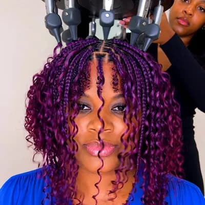 AI generated video: Using a very big automation braiding round machine on my client who have purple and wine colour hair...