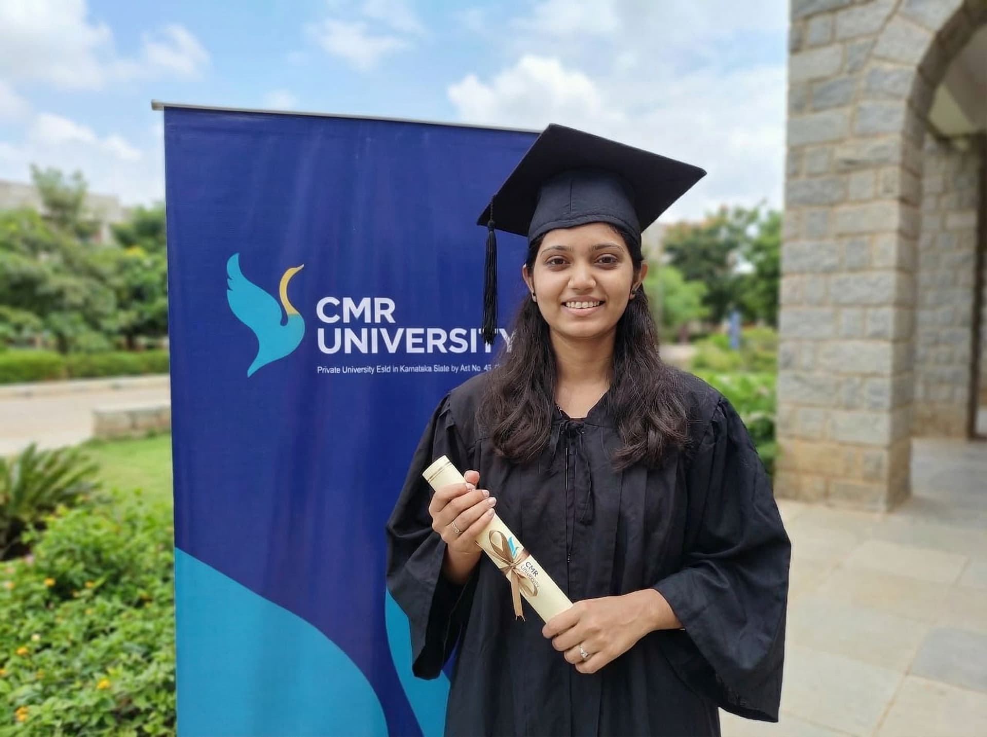 AI generated: Createmy graduation image using cmr logo visible in background and graduation attire and graduation ...