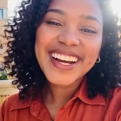AI generated video: Let the woman smile and start talking