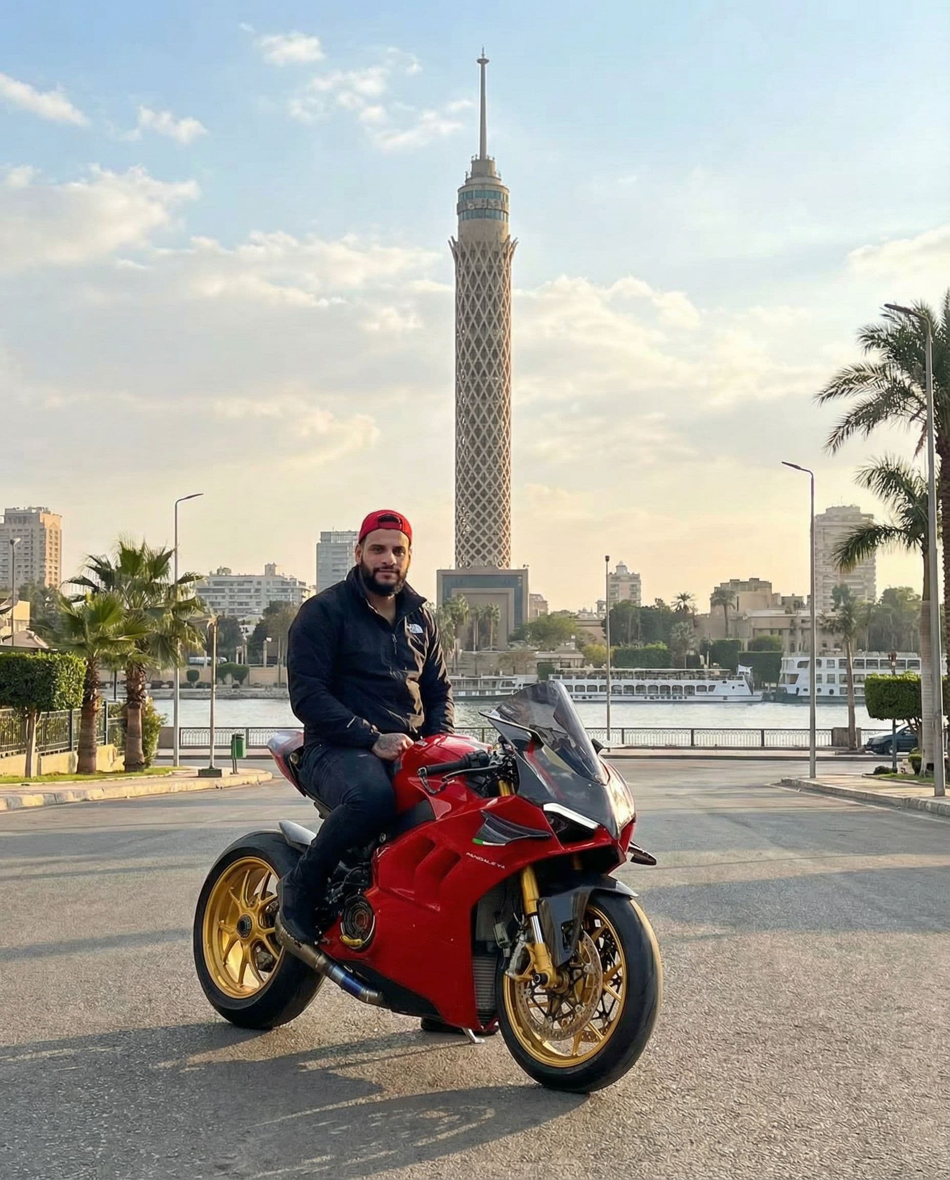 AI generated: Added this bike and the biker with Cairo Tower background