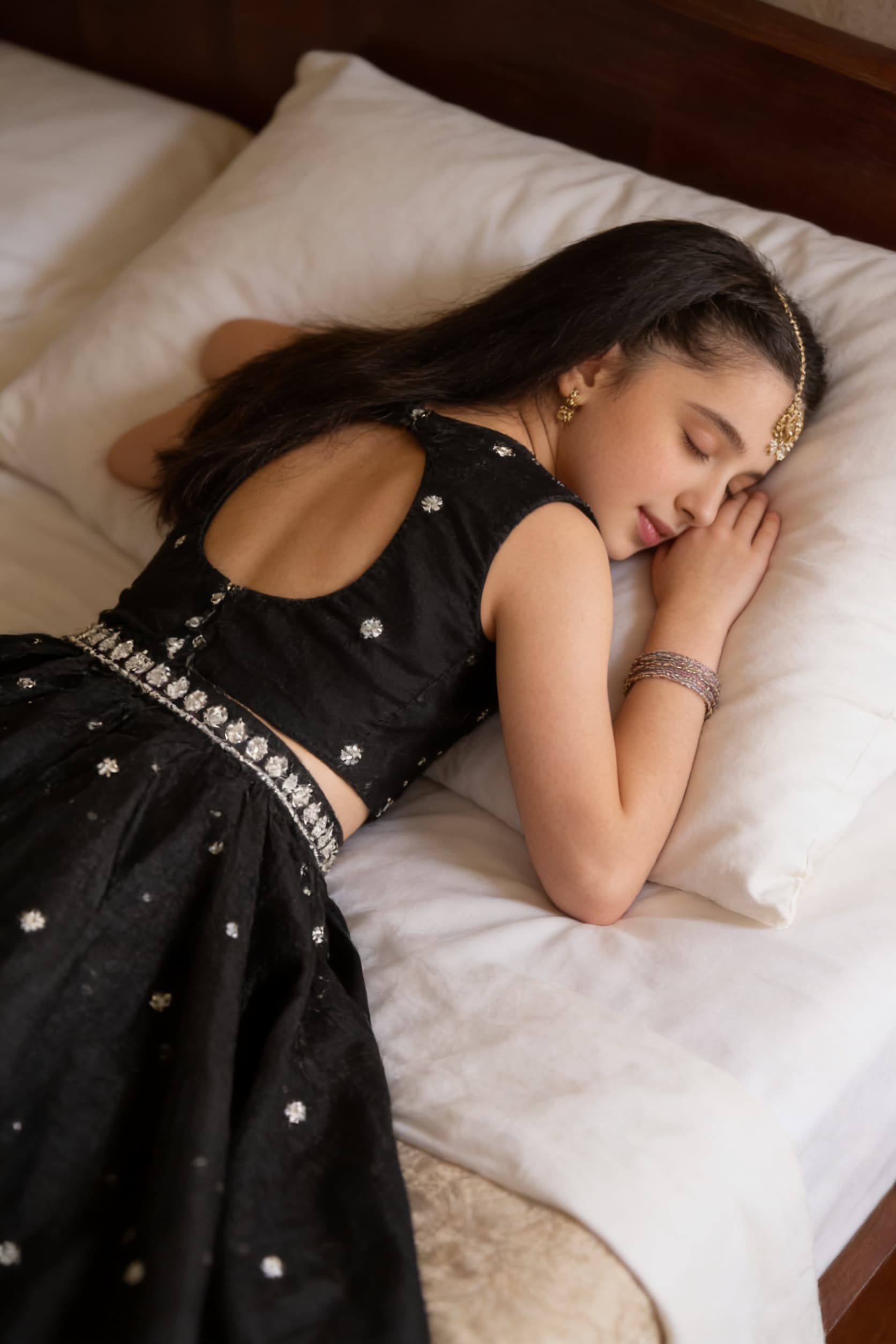 AI generated: Create the high realistic image as this Pakistani blogger is sleeping face down lying prone position...