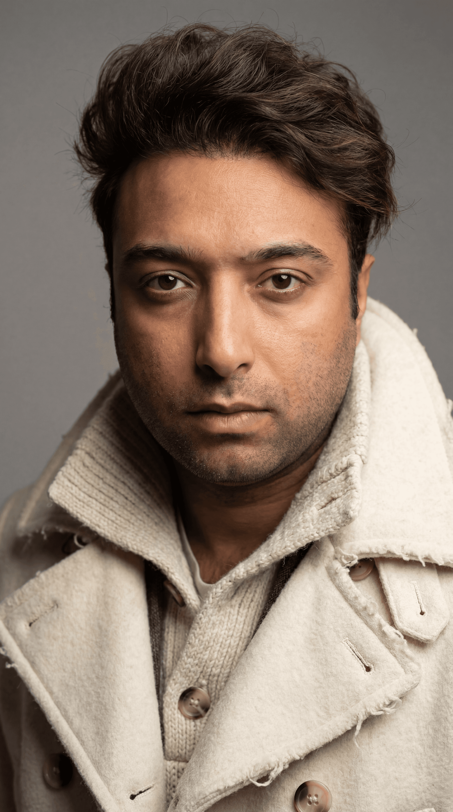 AI generated: # Goal
Generate a photorealistic portrait image of a young man that captures professional studio pho...