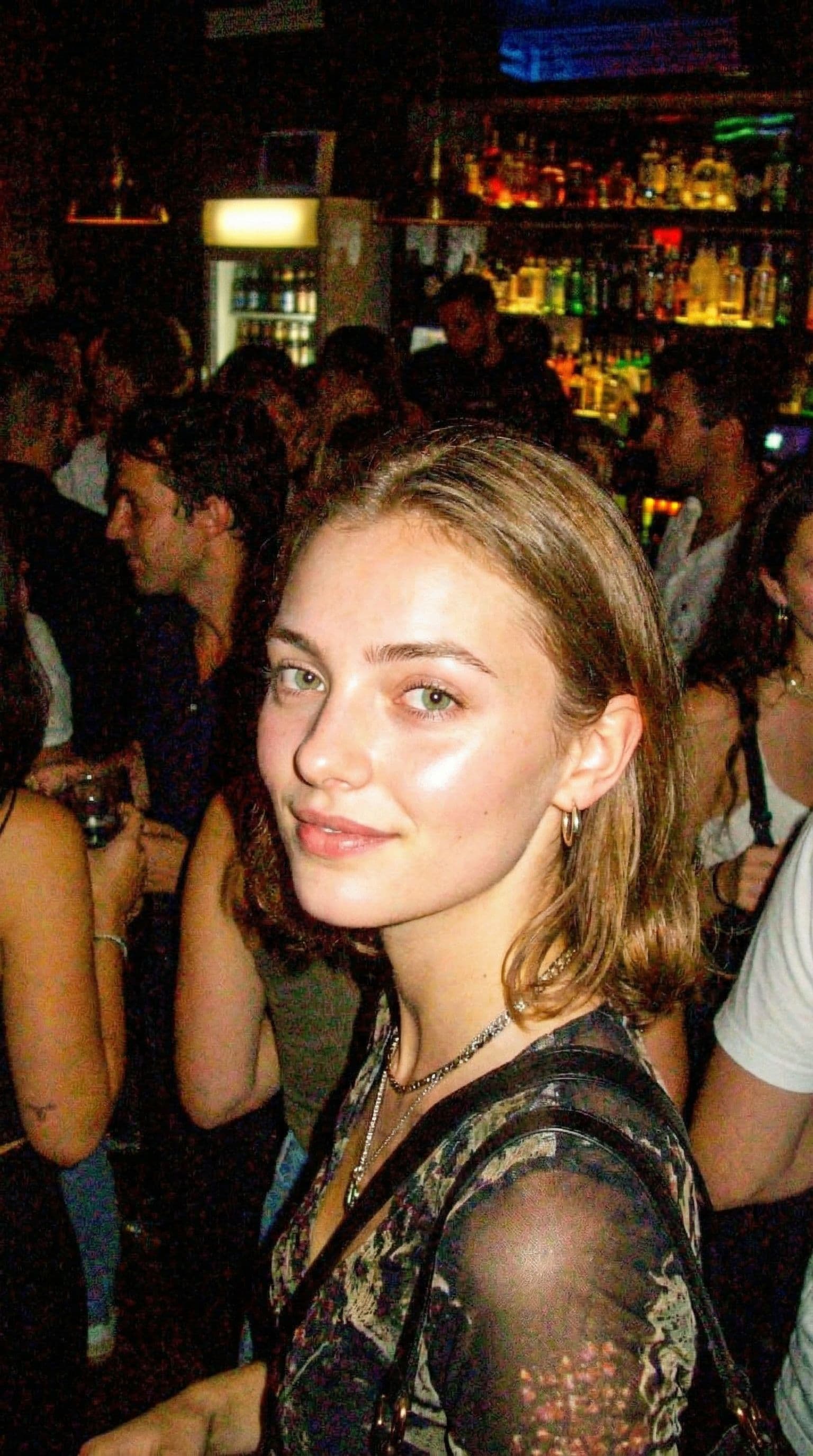 AI generated: photo taken with a compact digital camera from the early 1990s, grainy, saturated colours, flash pho...