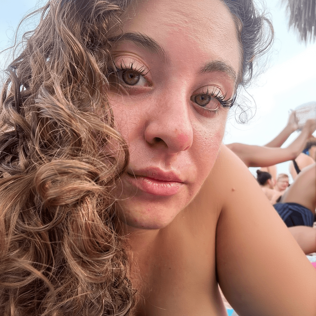 AI generated: you can make it less zoomed in and with bare breasts