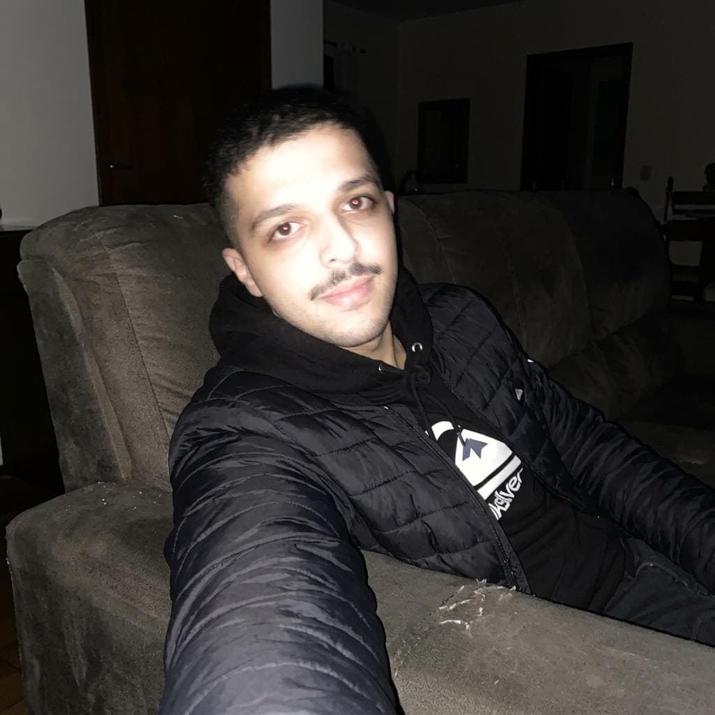 AI generated: Using the uploaded reference photo, create a standard iPhone selfie with flash. There's no clear sub...