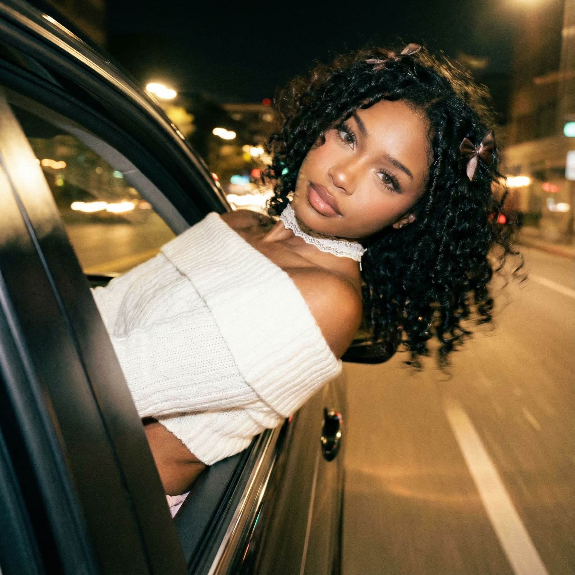 AI generated: Create a ccolor photo of me leaning my back out the window car like a dark dreamy blurry vintage win...