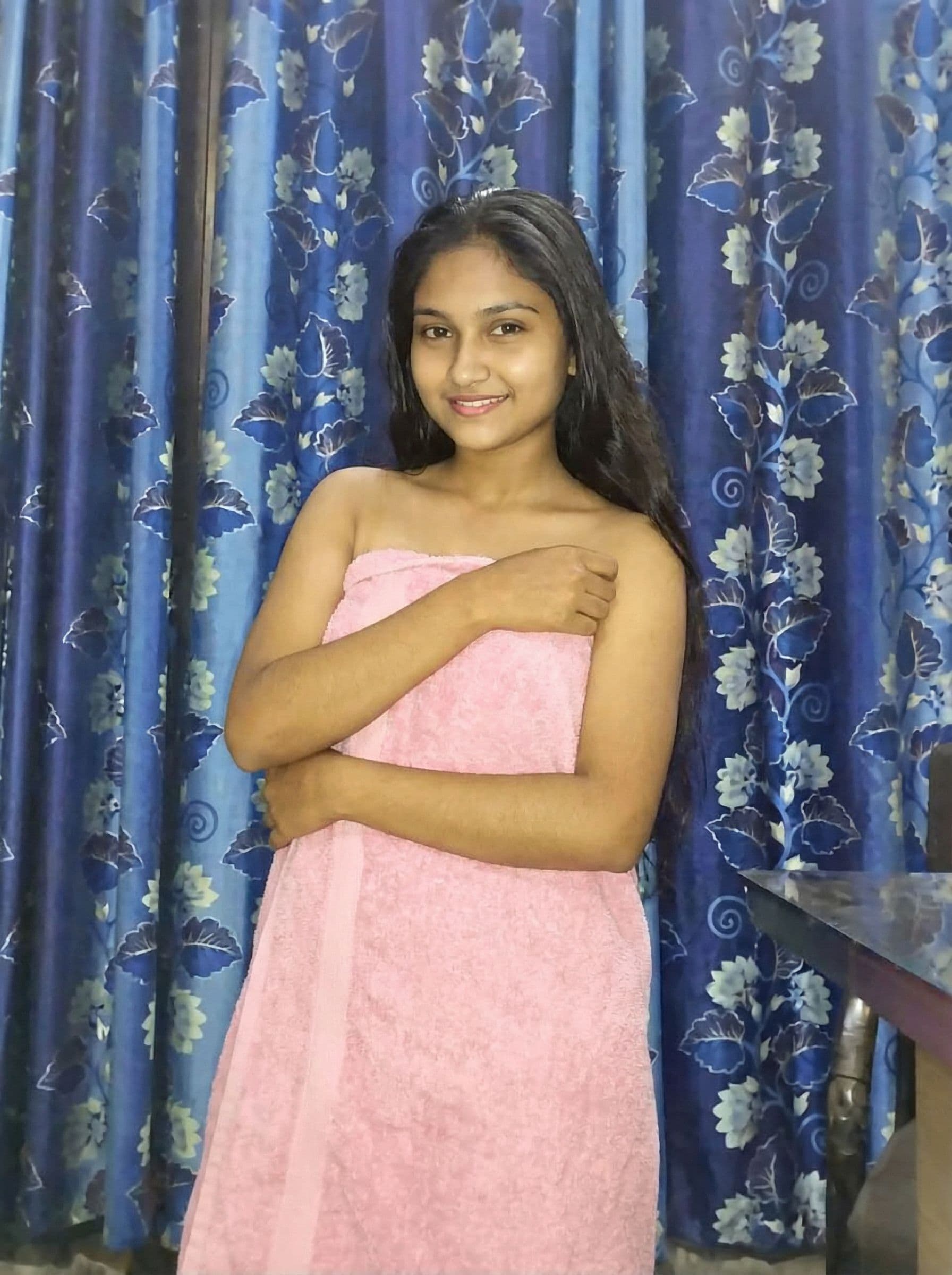 AI generated: Girl in pink towel