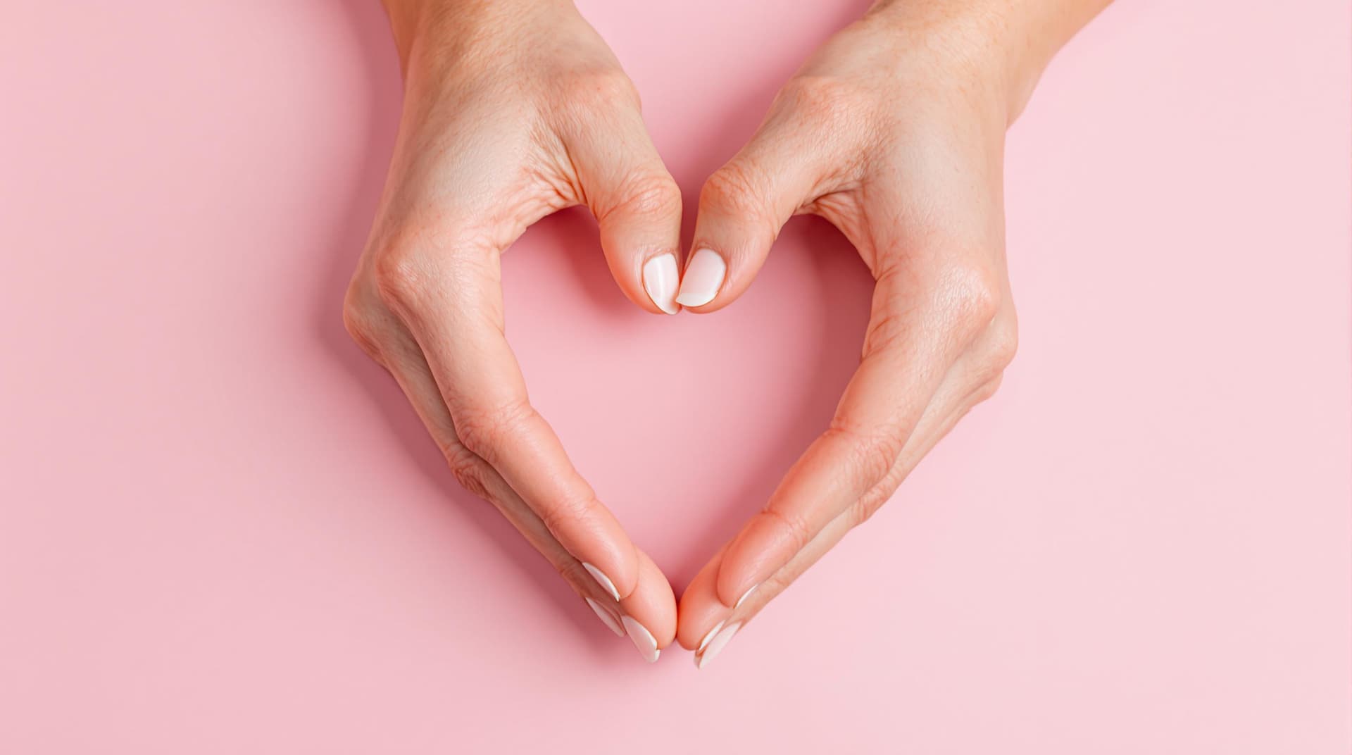AI generated: Heart shape made with hands, soft pink background, skin tones, gentle gesture, love symbol, minimali...