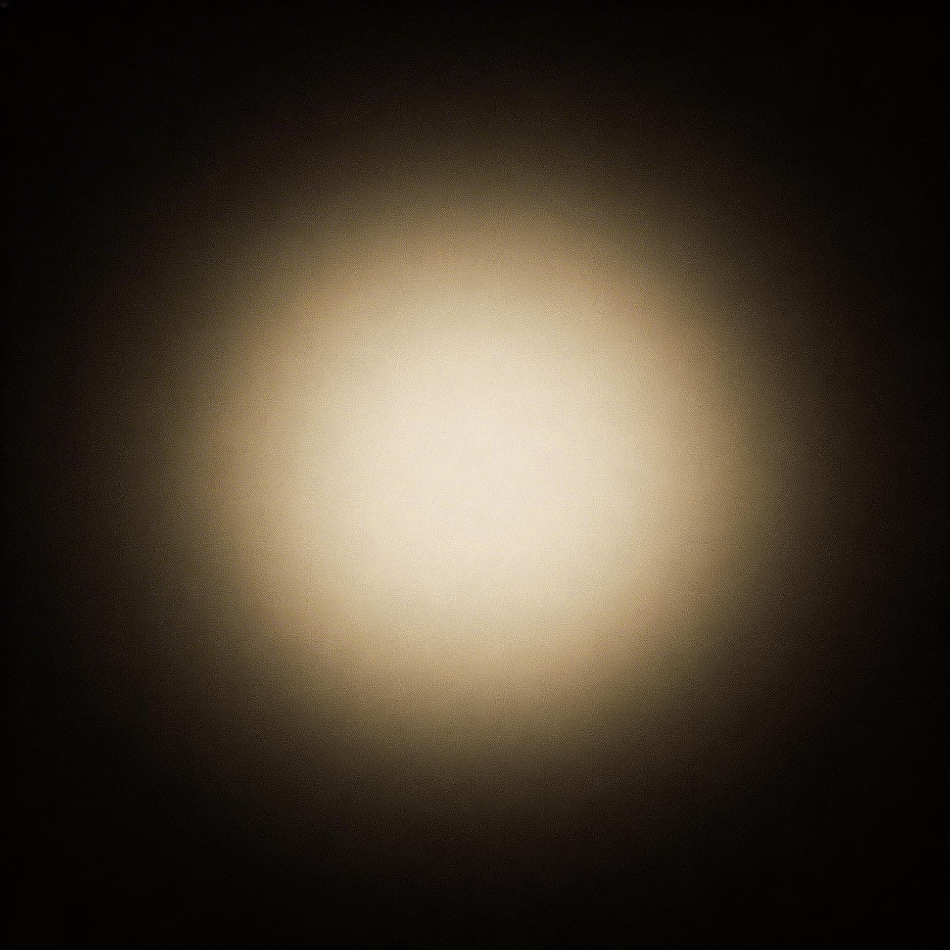 AI generated: dark minimal background, soft center glow fading into deep black edges, cinematic lighting, subtle t...