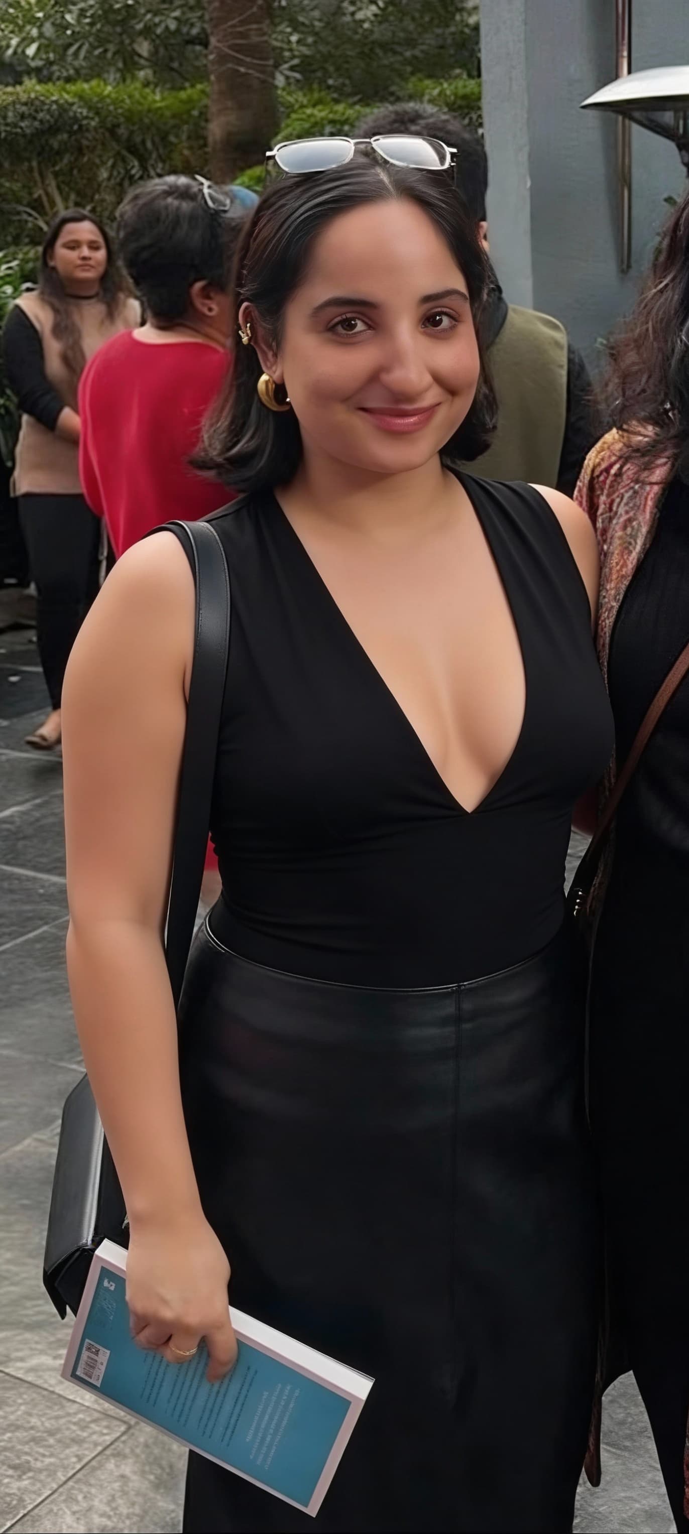 AI generated: make my dress into black dress sleevless and deepneck with same pose