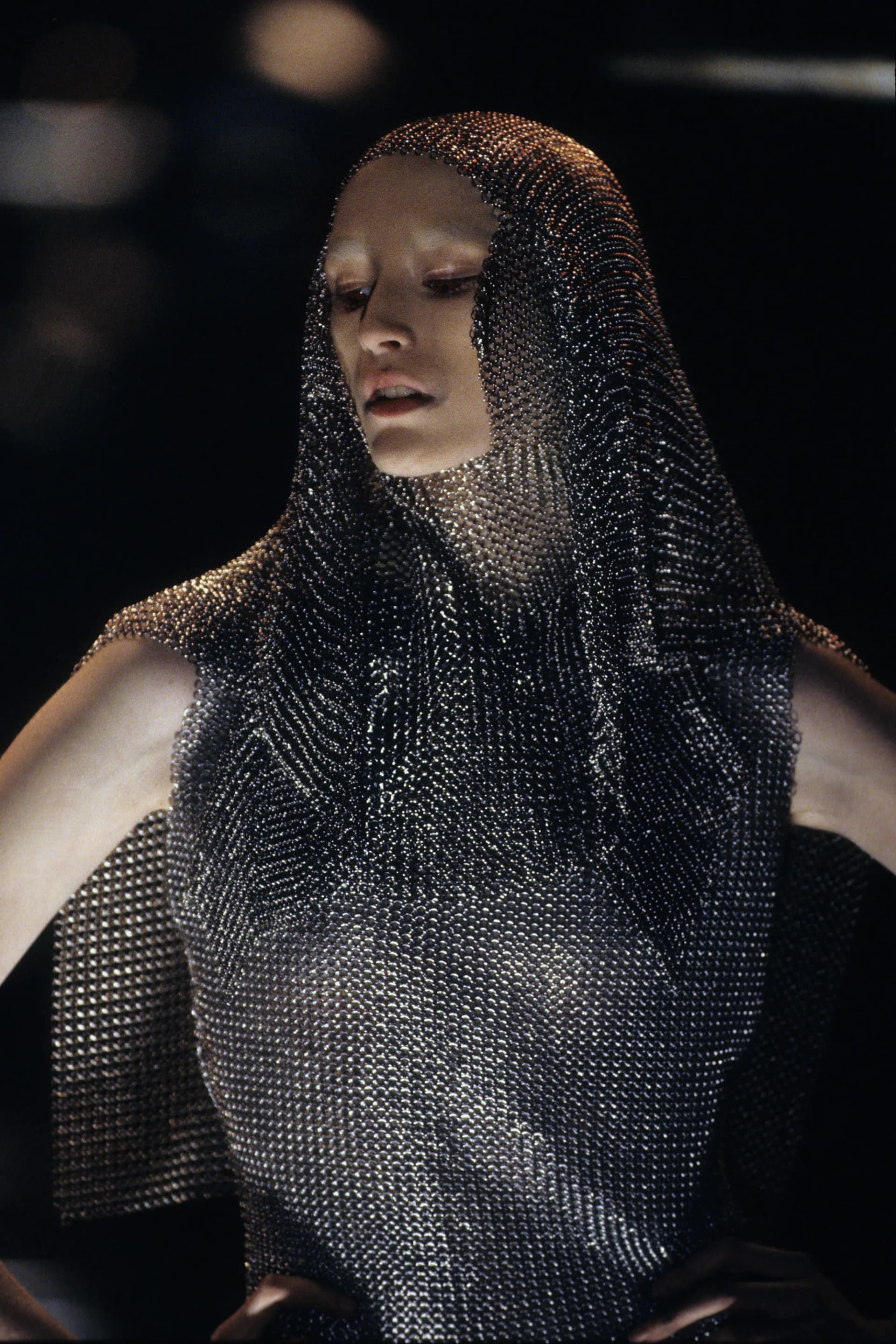 AI generated: create an activewear collection for women which is inspired by alexander mcqueen. she stands strong ...