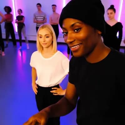 AI generated video: A smooth, 10-second video clip of a light-skinned Black dance instructor wearing a black beanie and ...
