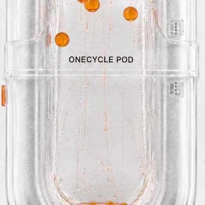 AI generated video: Animate only the tiny liquid orange droplets inside the transparent ONECYCLE POD. Keep the pod, labe...