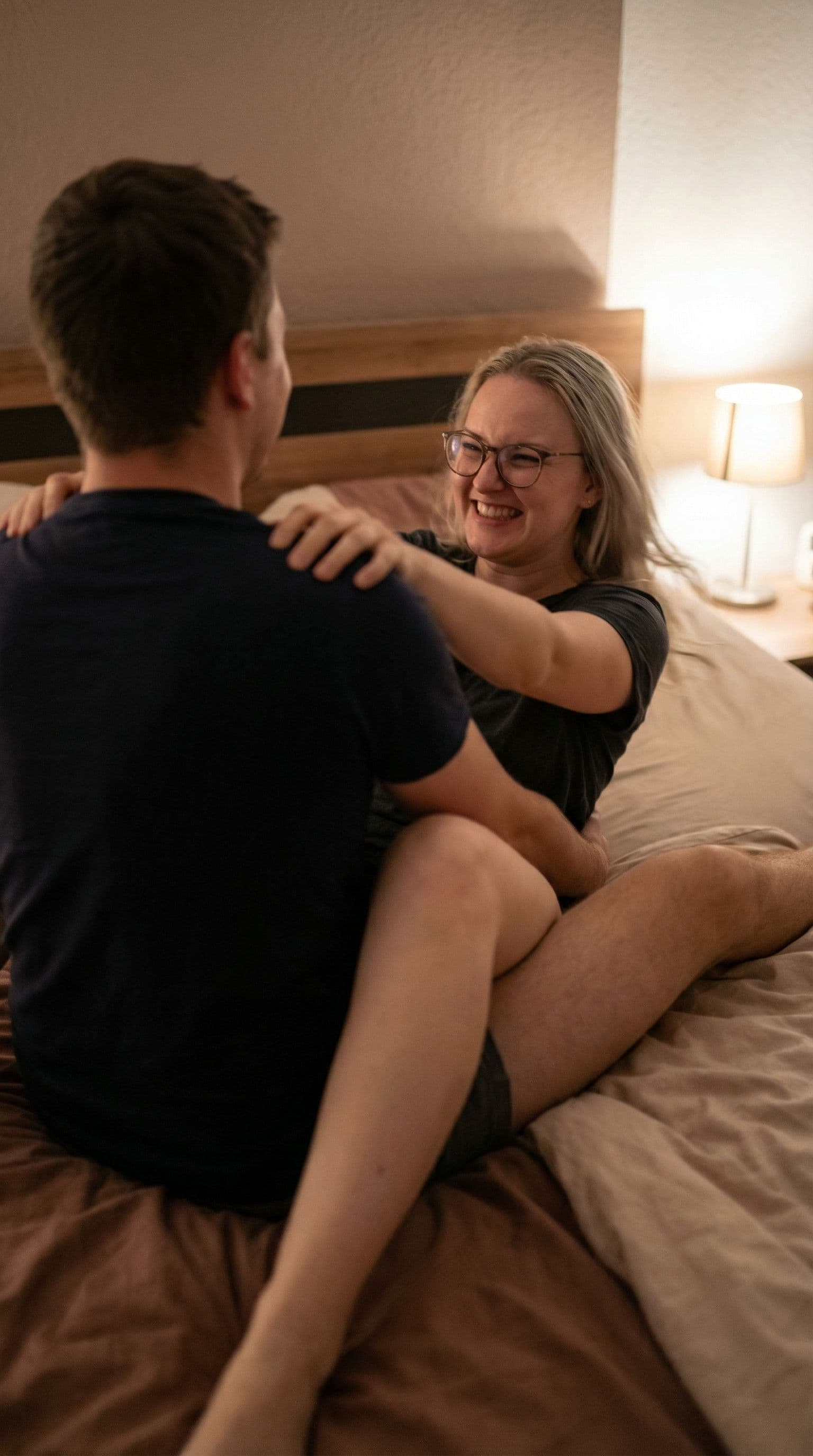 AI generated: Model is in a passionate encounter, missionary, with her legs spread having sex with a man. A man is...