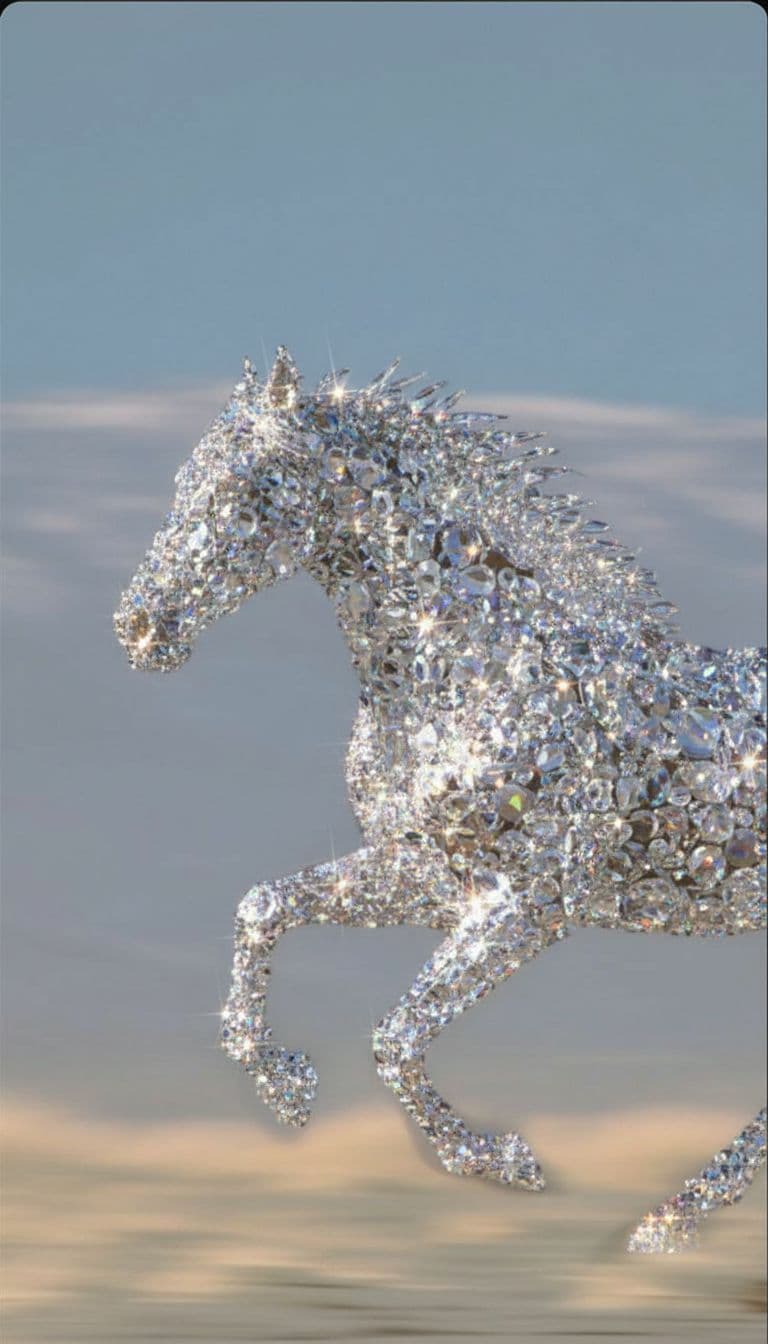 AI generated: The horse is made of Swarovski crystals and reflects the sun