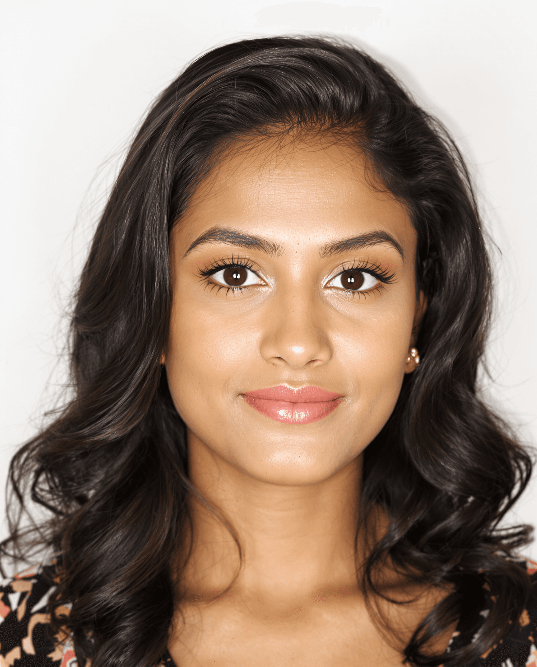 AI generated: "A stunningly attractive young Indian woman with defined brunette facial features, soft wavy dark br...