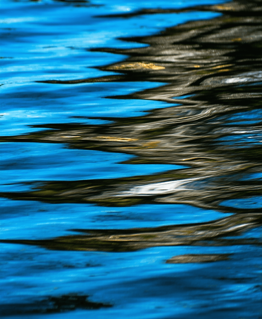 AI generated: Refine the blurry reflections on water, with no change in the component of the shot prompt .