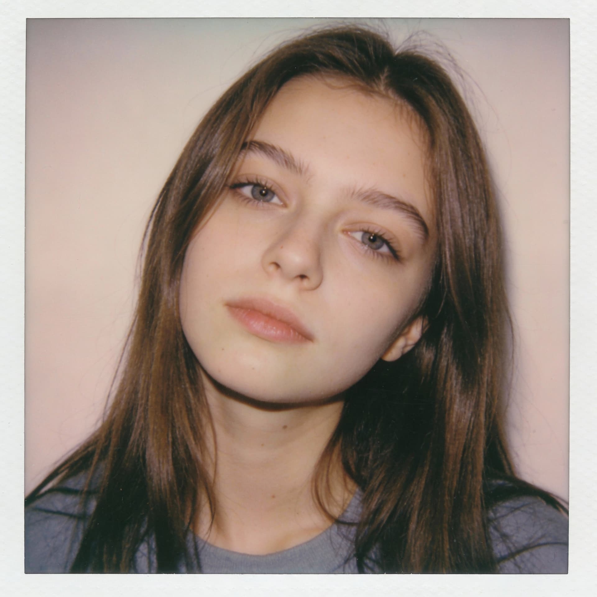 AI generated: Russian girl, 18-21 years old, brown hair, high-quality photo portrait, shot on a Polaroid camera, d...