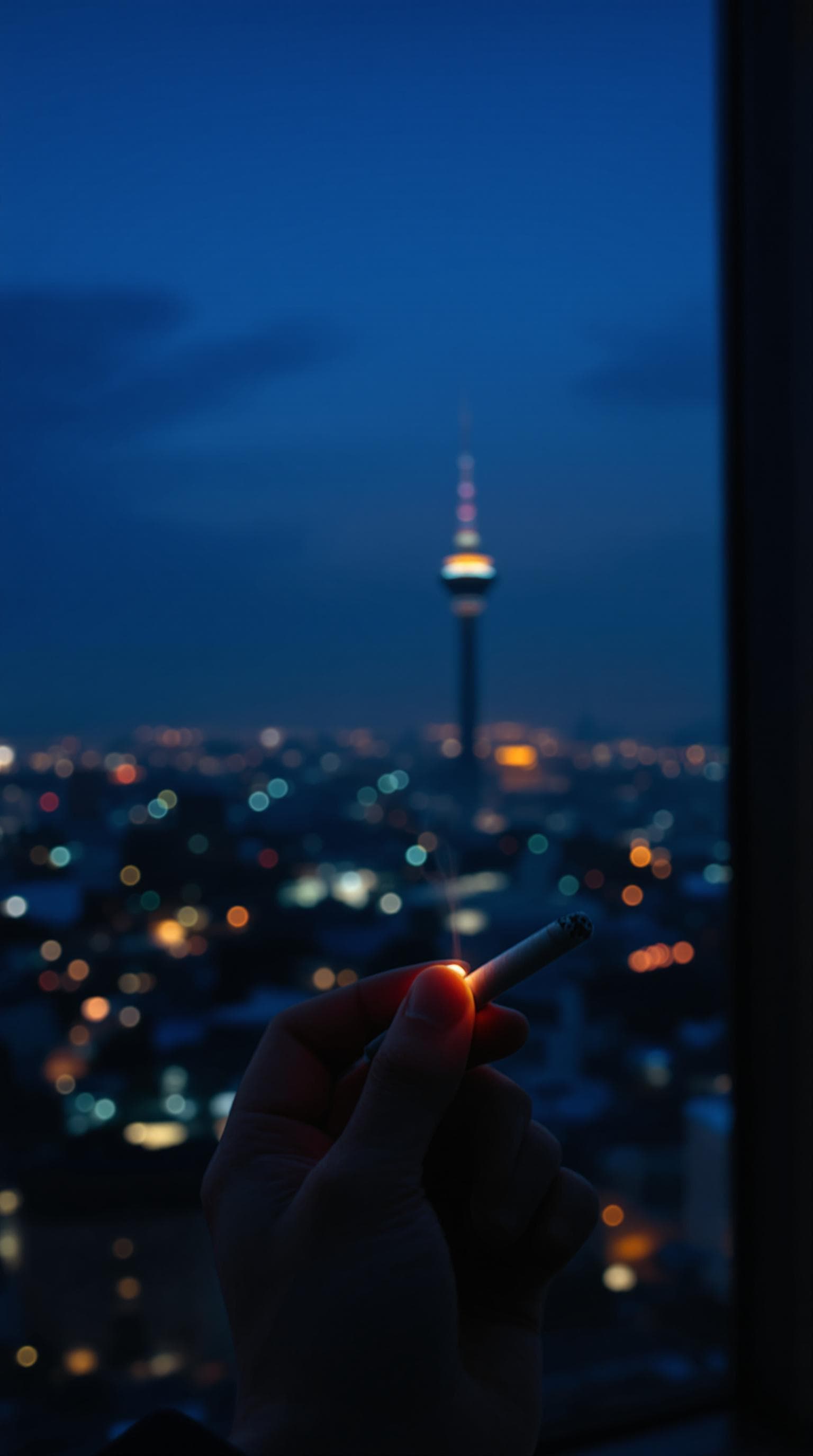 AI generated: POV first-person, i am standing by the window, smoking a cigarette, captured from a first-person per...