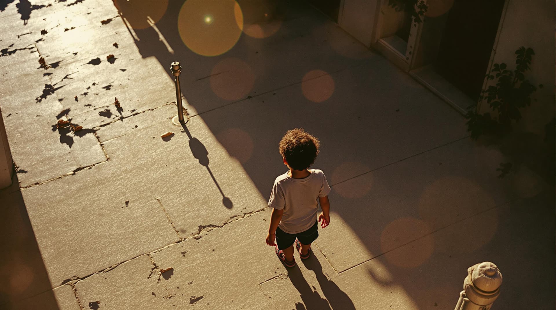AI generated: high angle shot from above, photo of a child in lebanon, shot with kodak portra 160 film, silhouette...