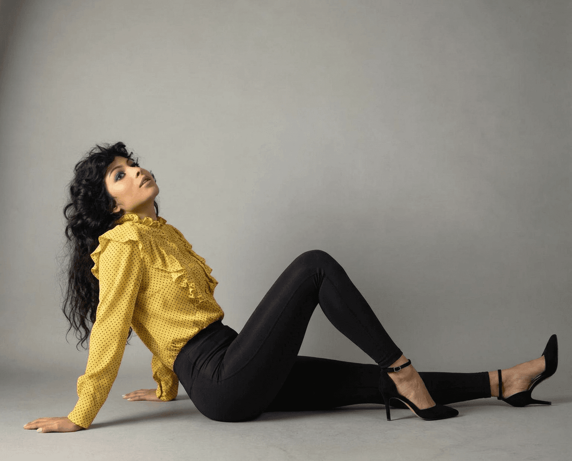 AI generated: Make the young model's pose as is, only change the model's jeans to a pair of black lycra tights and...
